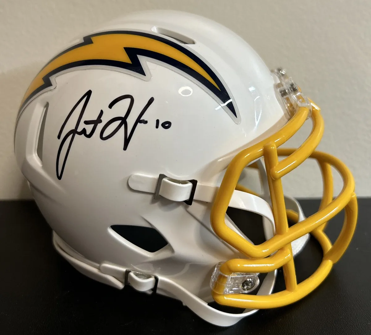 Signature detail on Justin Herbert Signed Chargers Mini Helmet.