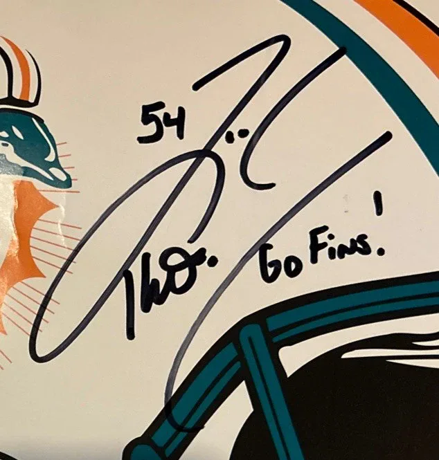 Signature detail on Zach Thomas Signed Miami Dolphins Poster.